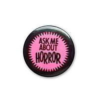 Image 1 of Ask Me About Horror Pink 1.5" Button