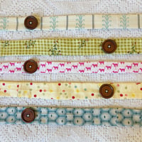 Image 1 of Button scarves 