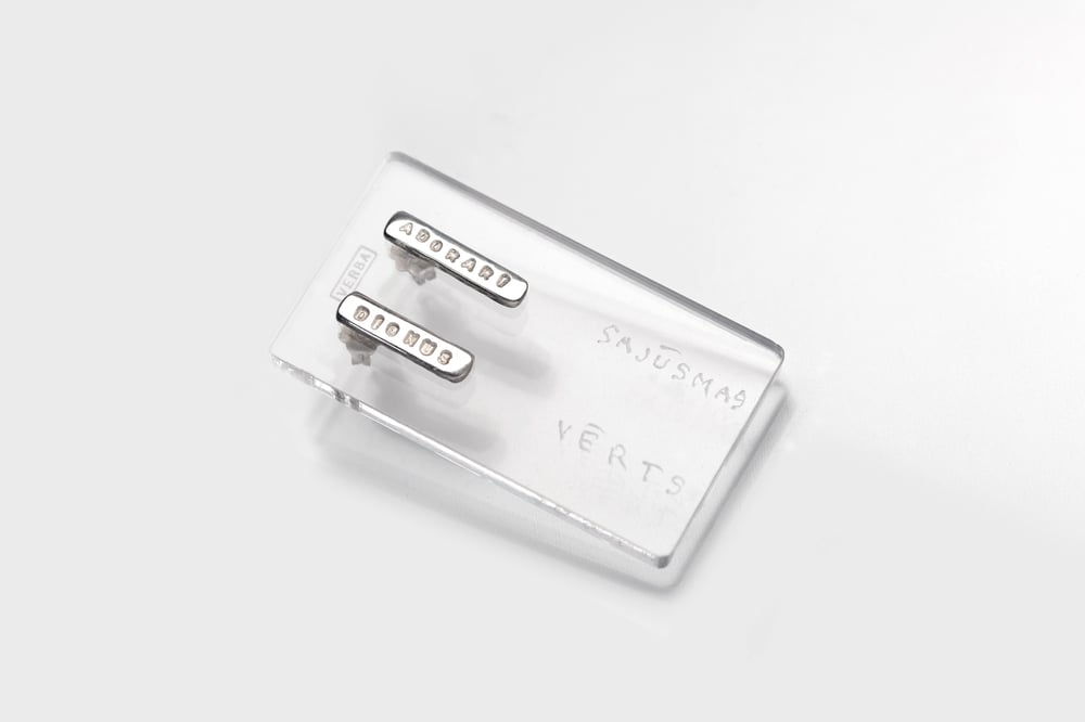 Image of Middle silver earrings with inscription in Latin 