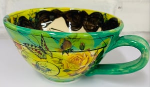 Image of Large green and yellow cup