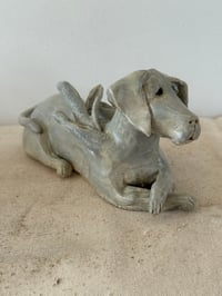 Image 4 of Winged Creatures: Green dog at rest