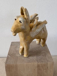 Image 11 of Winged Creatures: Three yellow donkeys-choose