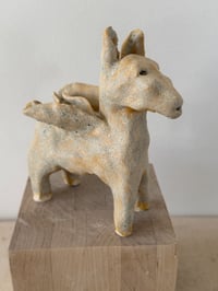 Image 16 of Winged Creatures: Three yellow donkeys-choose