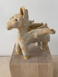 Image 17 of Winged Creatures: Three yellow donkeys-choose