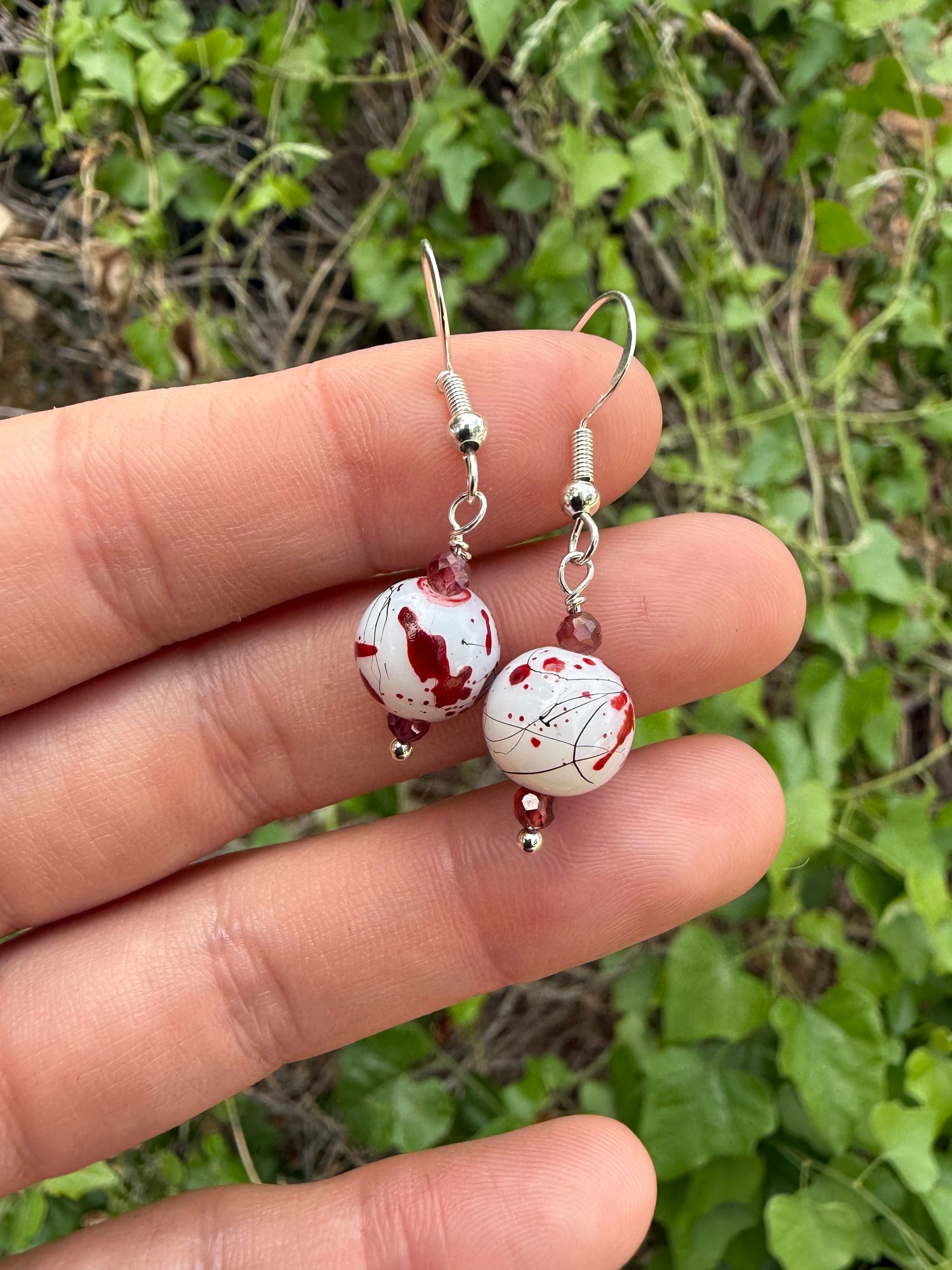 Bloodsplatter earrings with garnet