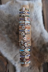 Image 4 of BRACCIALI -con fetta di corno e perline- 