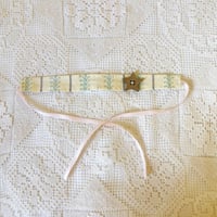Image 1 of Cream floral star chocker
