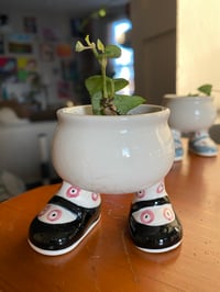 Image 1 of String of Hearts in Walking Legs Egg Cup BLACK (4 TOTAL)