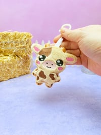 Image 1 of Chibi Chocolate Milk Cow Cute Bag Charm Plushie