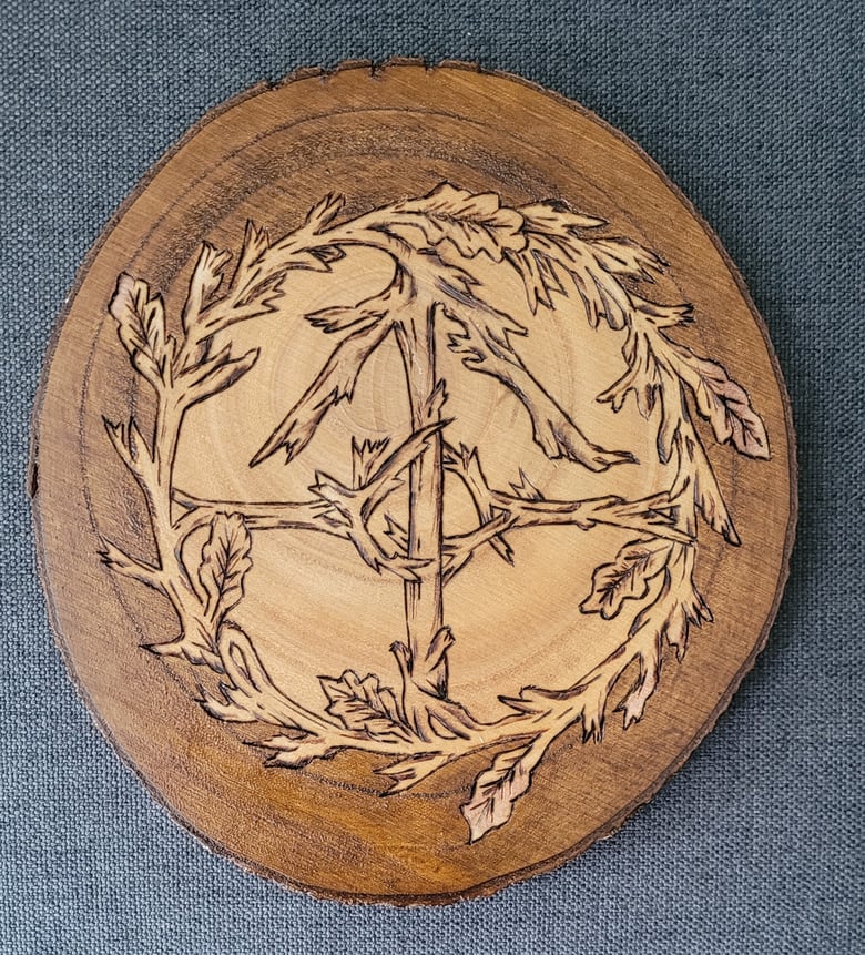 Image of Teiwaz wood burning piece 
