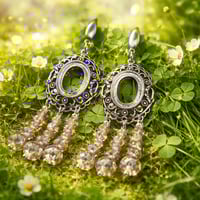 OPEN SILVER BEZEL WITH CLEAR AMBER COLORED BEADS