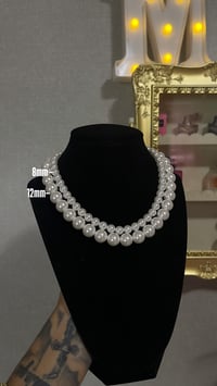 Elegant pearl necklaces 🐚🕯️