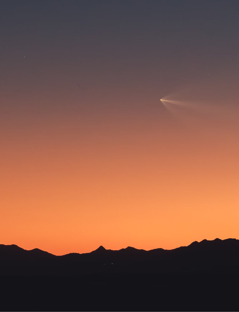 Image of rocket launch, sunset, white sands, NM
