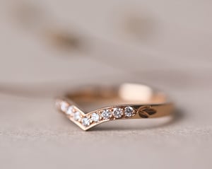 Image of 18ct rose gold white diamond set wishbone semi-eternity ring