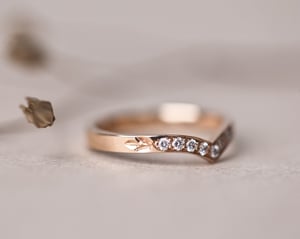 Image of 18ct rose gold white diamond set wishbone semi-eternity ring
