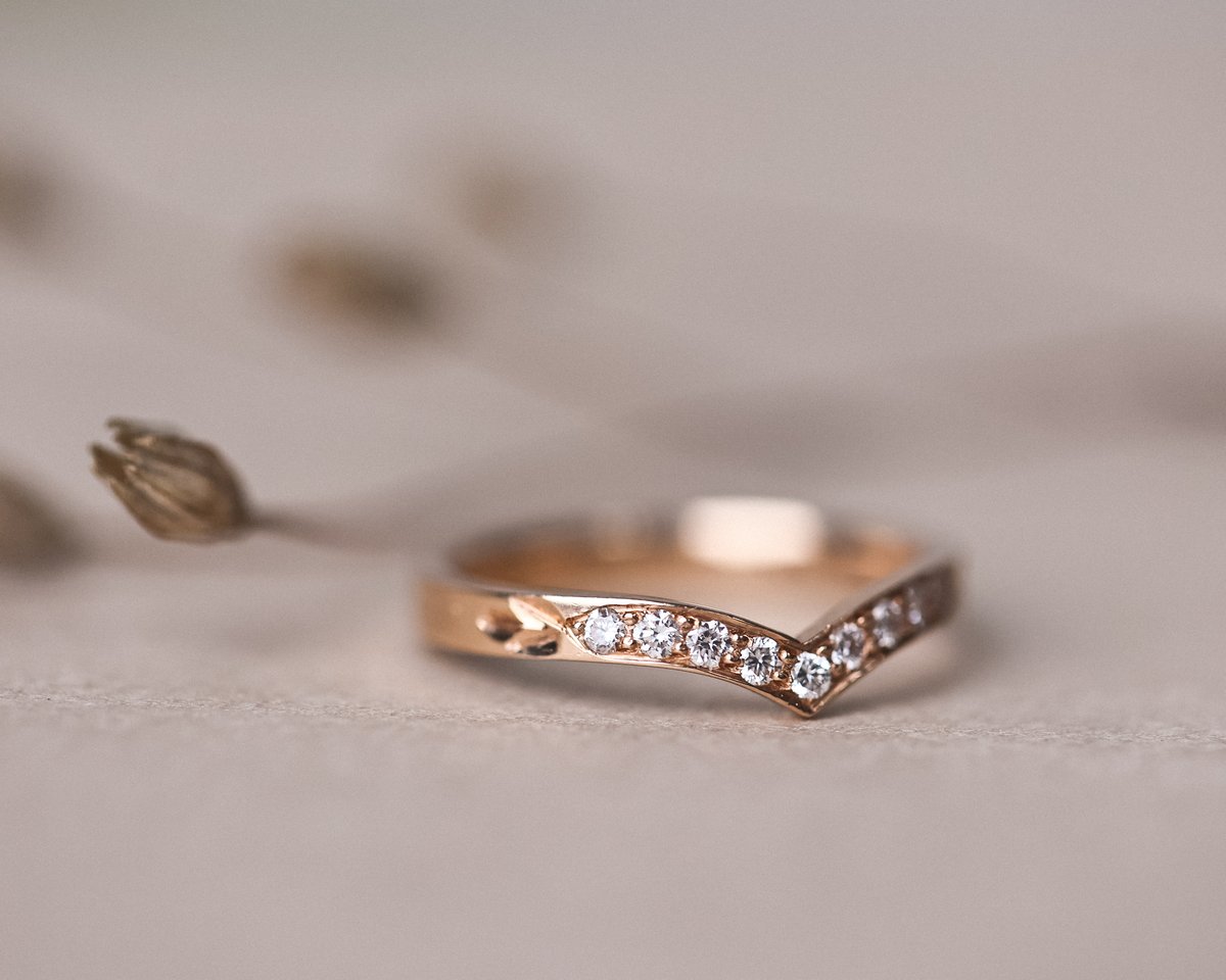 Image of 18ct rose gold white diamond set wishbone semi-eternity ring