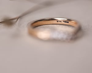 Image of 18ct rose gold white diamond set wishbone semi-eternity ring