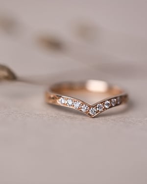 Image of 18ct rose gold white diamond set wishbone semi-eternity ring