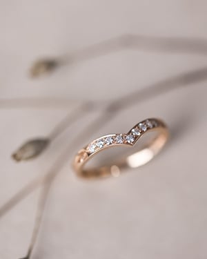 Image of 18ct rose gold white diamond set wishbone semi-eternity ring