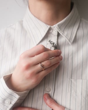 Image of 18ct rose gold white diamond set wishbone semi-eternity ring