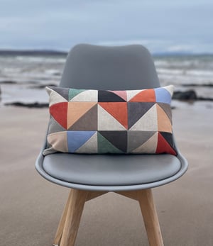 Image of Orange triangles, patchwork cushion with plant-dyed panels