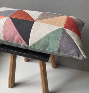 Image of Orange triangles, patchwork cushion with plant-dyed panels