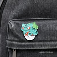 Image 1 of Bulbasaur Poké Ball Enamel Pin