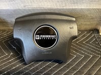 Image 1 of Silverado /TBSS Steering wheel emblem logo -- GM PERFORMANCE