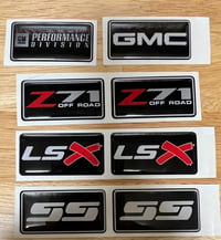 Image 1 of Pair of Epoxy domed emblems - your choice of 2