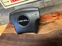 Image 1 of Silverado/SUV steering wheel emblem logo -- Denali