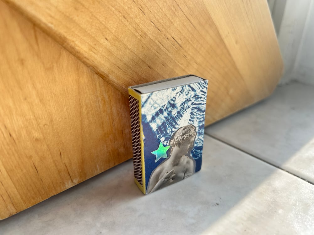 Image of matchbox - blue lady 