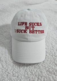 Life sucks but I suck better cap