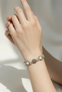  IMITATION PEARL HEART BRACLET WITH IRIDESCENT SQUARE BEADS SURROUNDED BY SILVER CIRCLE