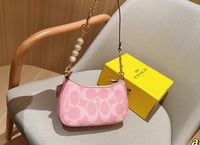 Image 3 of Coach Nolita 19 in Signature Canvas.