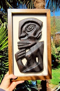Image 1 of Tiki thinking