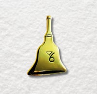 Image 1 of Gladys's Golden Bell Enamel Pin