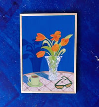 Image 1 of Tulips on table