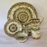 Image 1 of Orange and gold pieces