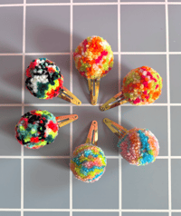 Image 1 of pom pom hair clips