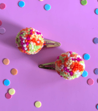 Image 4 of pom pom hair clips
