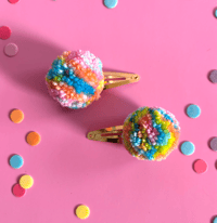 Image 2 of pom pom hair clips