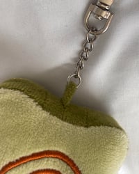 Image 4 of Matcha Swirl Kitty Bread Plushie Keychain