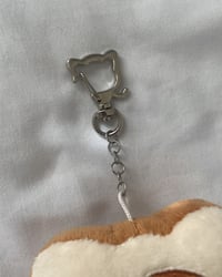 Image 8 of swirl kitty bread plushie keychain