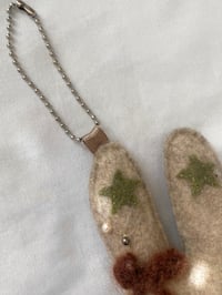 Image 3 of matcha swirl star bunny plushie keychain 