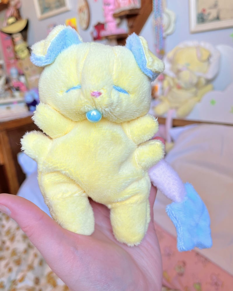Image of Hugg-A-Me Babey! Yellow with blue binkie 