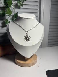 night time sun necklace 