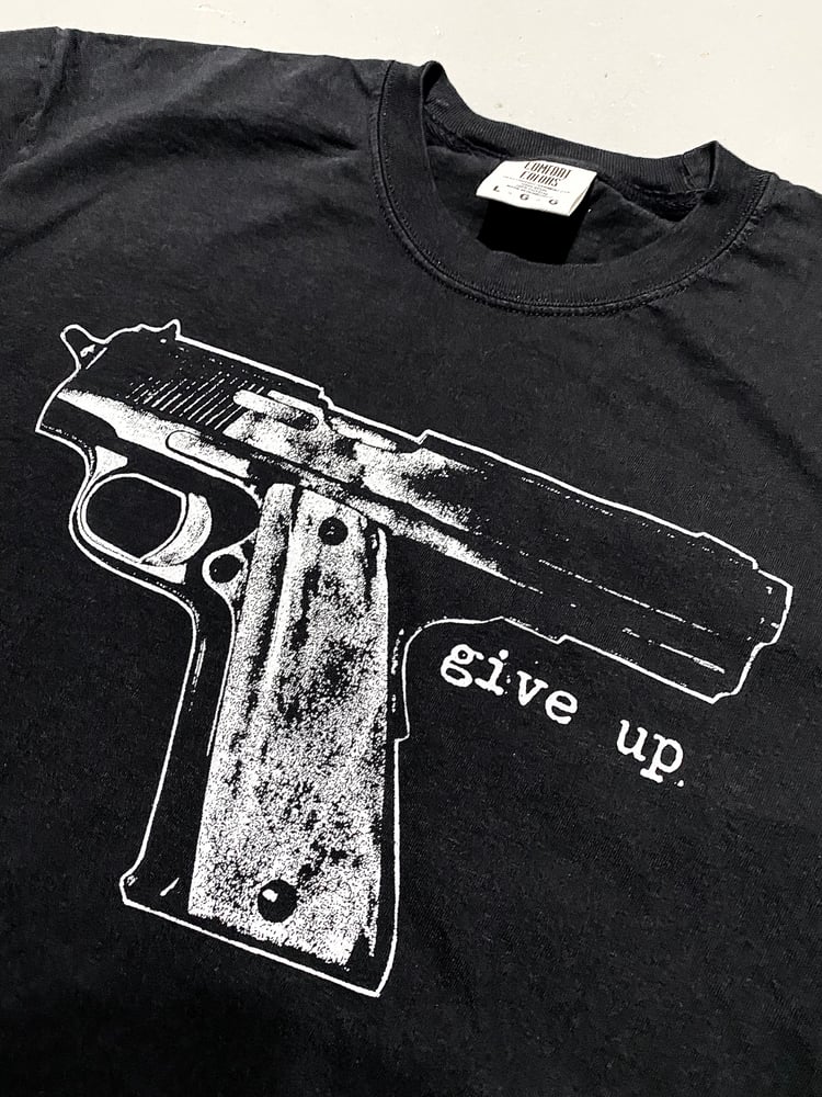 Image of pistol tee