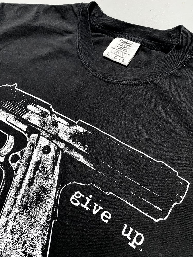 Image of pistol tee