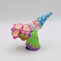Image 1 of Peter the gnome with pink paper flowers