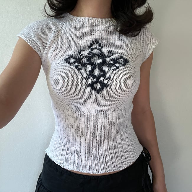 moth tee with duplicate stitch cross